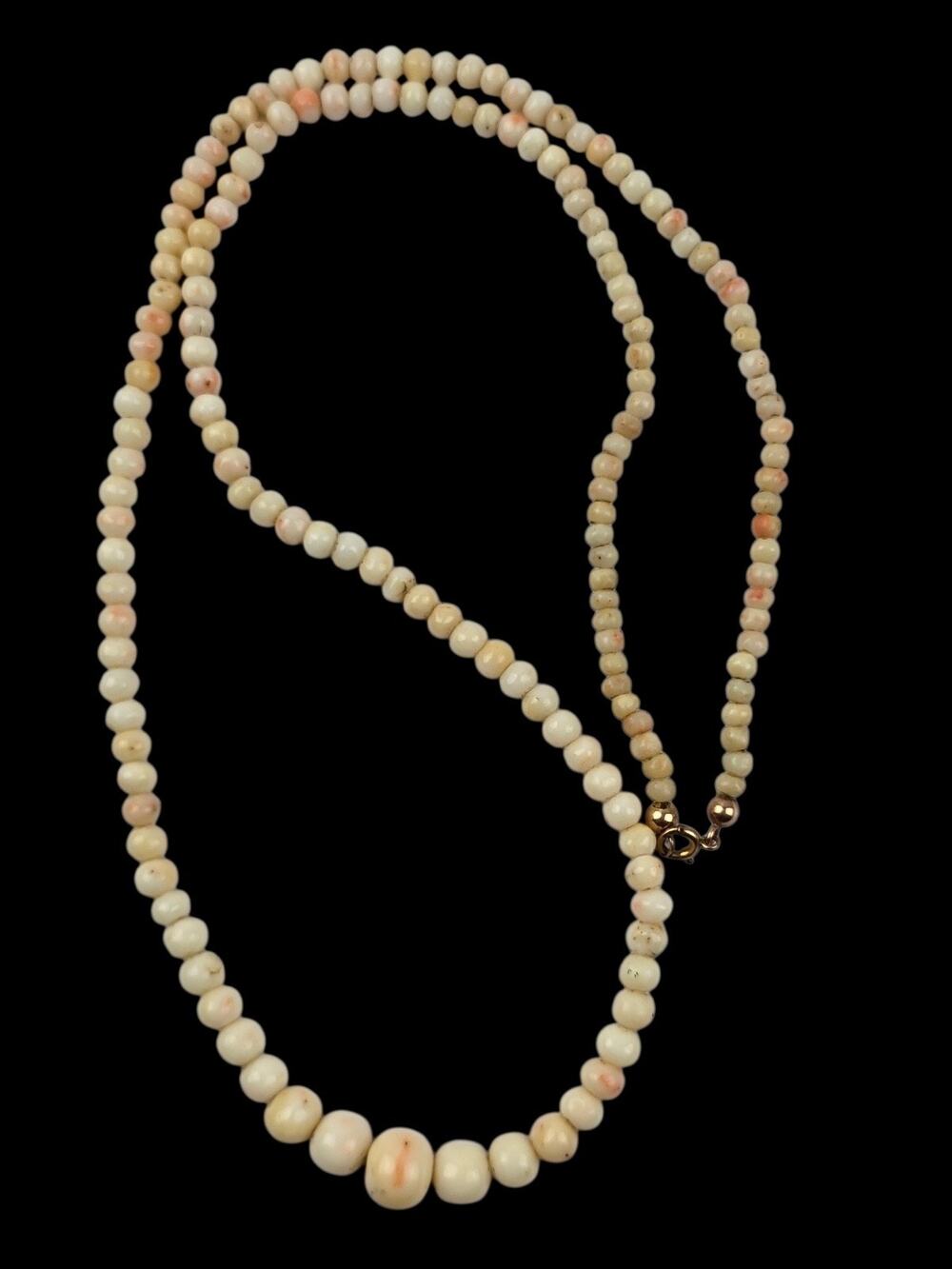Angel skin coral graduated beaded necklace 24" Length 10kt gold clasp